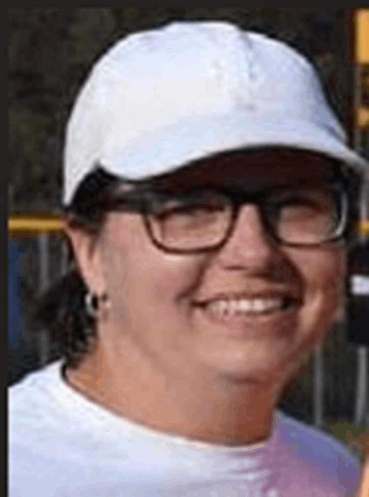 lady with glasses and white ballcap 